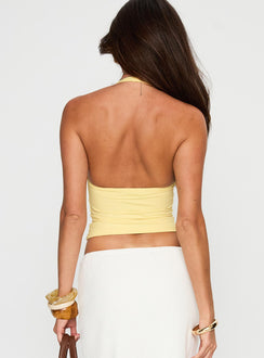 back view of model wearing Princess Polly Impress Me Halter Top Lemon Sleeveless Plunger 