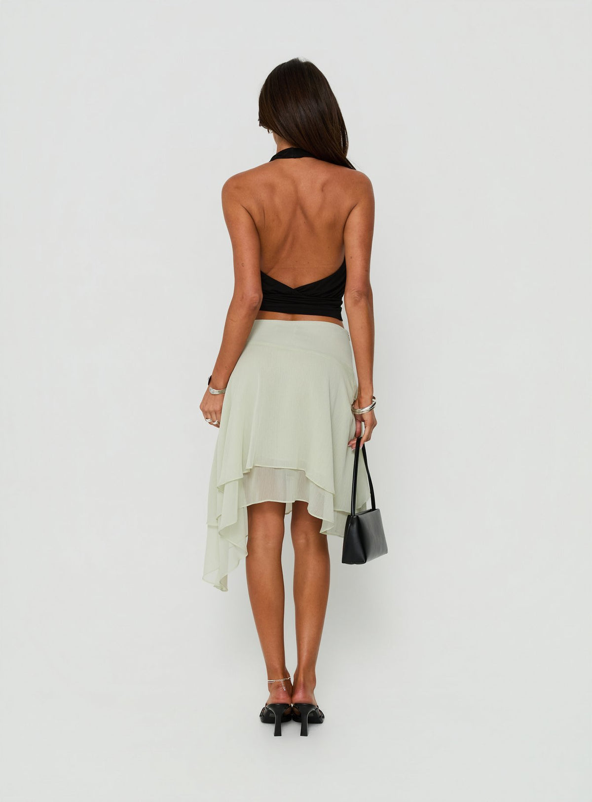 View of the Ophella Tie Waist Chiffon Midi Skirt Sage womens-skirts back view of model wearing Princess Polly