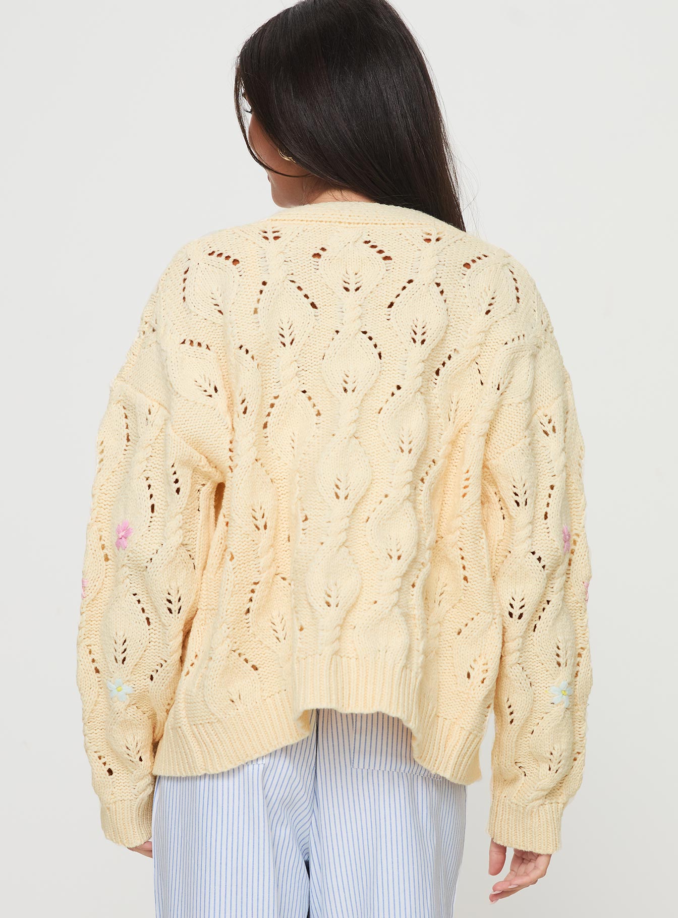 back view of model wearing Princess Polly Daffodil Cardigan Cream Cropped 