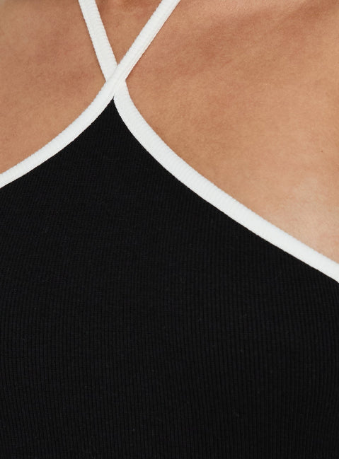 Highlighting the sleeveless construction, the Azara Contrast Arrowneck Bodysuit Black / White womens-bodysuit Princess Polly