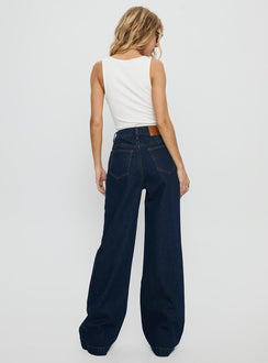 back view of model wearing Princess Polly Goldie High Rise Wide Leg Jeans Indigo High Rise Jeans 
