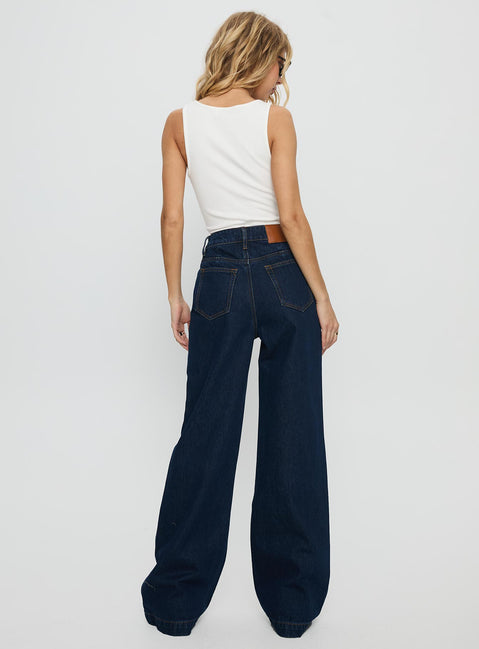 back view of model wearing Princess Polly Goldie High Rise Wide Leg Jeans Indigo High Rise Jeans 