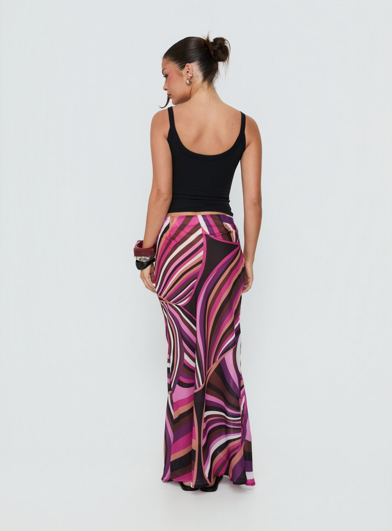 Designed with the Lucidia Maxi Skirt Pink Retro in womens-skirts featuring maxi length back view of model wearing Princess Polly
