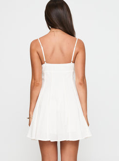 back view of model wearing Princess Polly Libertie Pleat Mini Dress White V-Neck 