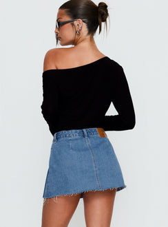 back view of model wearing Princess Polly Debera Pleated Mini Skirt Mid Blue Wash 