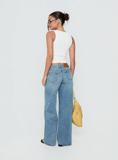 Presenting the Darla Low Rise Straight Leg Jean in Vintage Light Blue as womens jeans with low-rise back view of model wearing Princess Polly