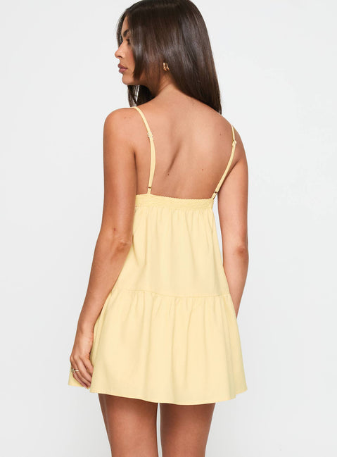 back view of model wearing Princess Polly Nicoletta Mini Dress Lemon Plunger 
