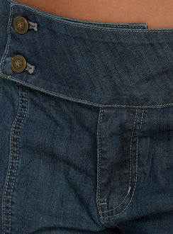 Highlighting the Nikoletta Mid Rise Wide Leg Cargo Jeans Dark Blue Wash in womens-jeans with mid-rise waistband detail