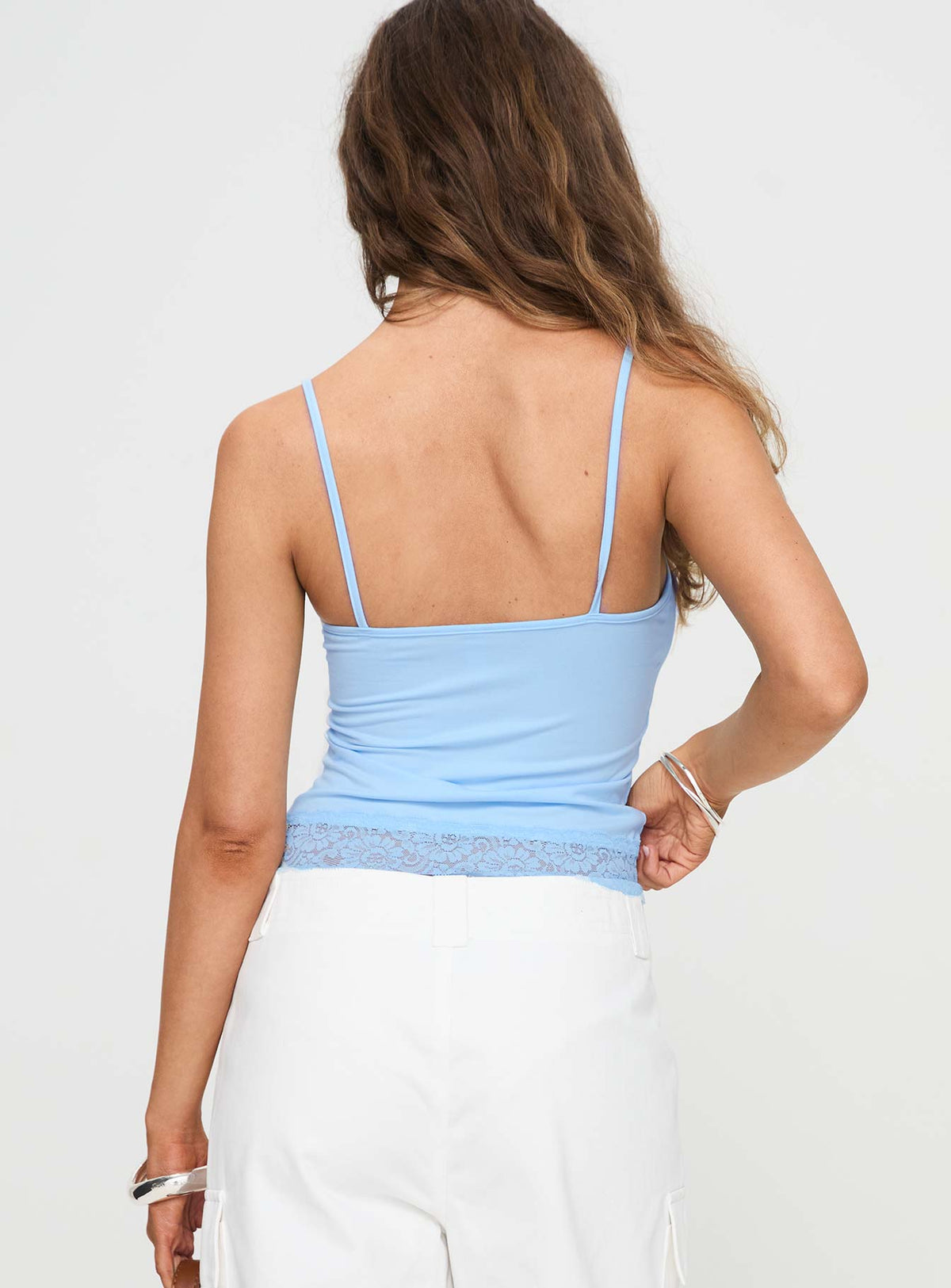 back view of model wearing Princess Polly Vikha Top Blue Sleeveless Square Neck 