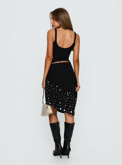 back view of model wearing Princess Polly Jezabela Asymmetrical Stud Midi Skirt Black 