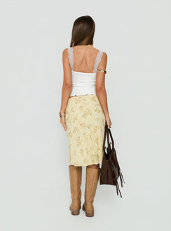 Presenting the Evina Picot Trim Midi Skirt Yellow Paisley womens-skirts with a-line shape, frill details, fitted silhouette, frayed hem, and midi length back view of model wearing Princess Polly