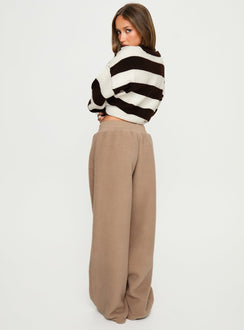side view of model wearing Princess Polly Siberia Fleece Track Pant Light Brown High Rise Pants 