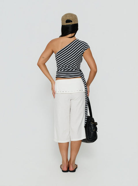 Designed with the Oren Capri Trouser Ivory womens-regular-pants featuring mid-rise and belt back view of model wearing Princess Polly