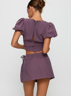 back view of model wearing Princess Polly Gulliver Tie Side Mini Skort Mauve High Waisted Shorts 