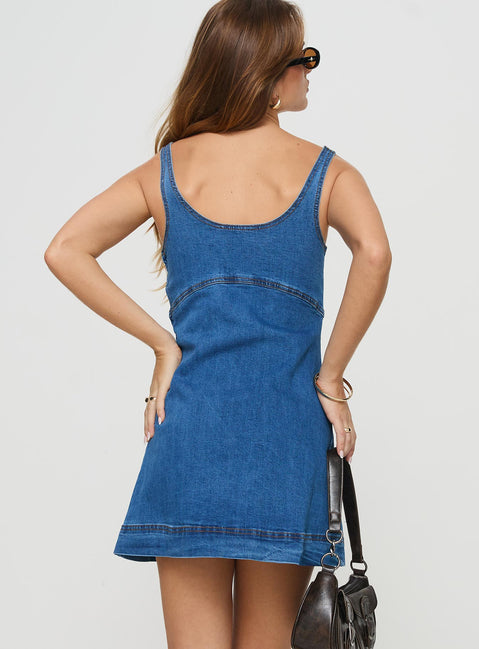 back view of model wearing Princess Polly Rautha Denim Mini Dress Mid Wash Scoop Neck 
