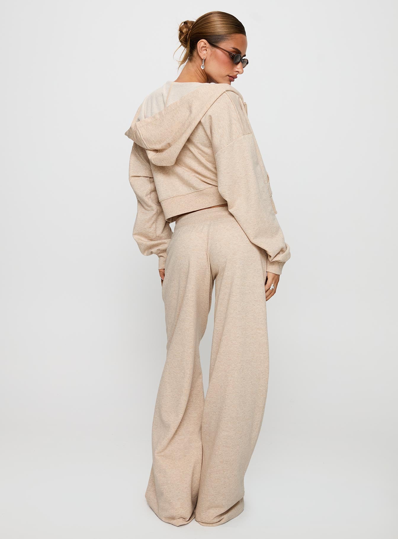 back view of model wearing Princess Polly Mindful Low Rise Pant Oat Marle 