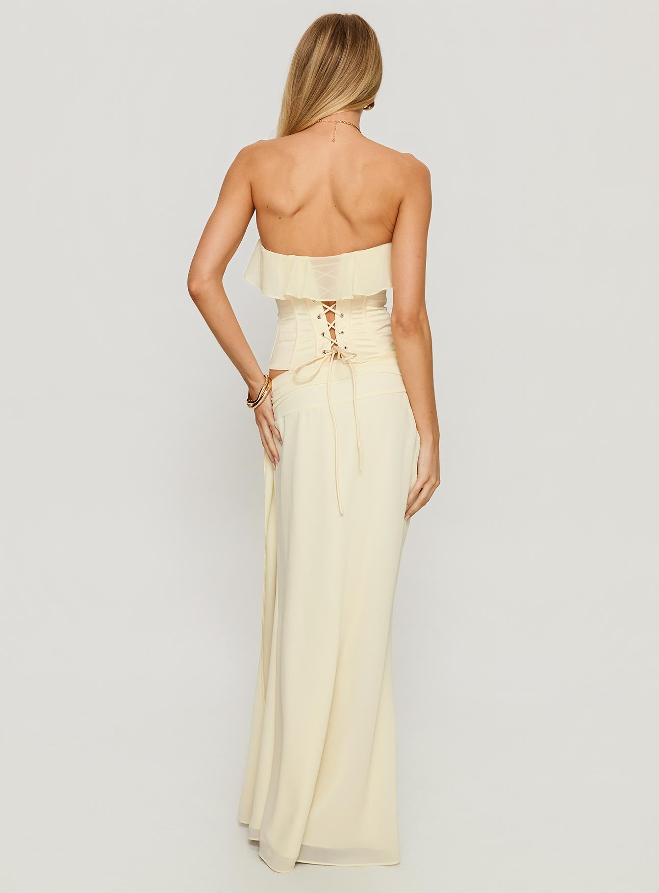 back view of model wearing Princess Polly Holliann Draped Maxi Skirt Butter Maxi Skirts 