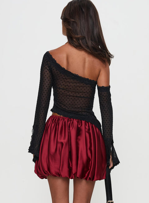 back view of model wearing Princess Polly Rubee Bubble Hem Mini Skirt Red Mini Skirts 