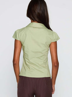 back view of model wearing Princess Polly Crowd Control Collared Top Sage Short Sleeves Plunger 