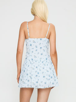 back view of model wearing Princess Polly California Dream Mini Dress Blue / Floral Scoop Neck 
