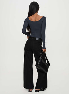 back view of model wearing Princess Polly Colemane Mid Rise Denim Jeans Black High Waisted 