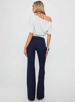 back view of model wearing Princess Polly Kinkirk Flared Pants Navy Pinstripe Low Rise Pants 