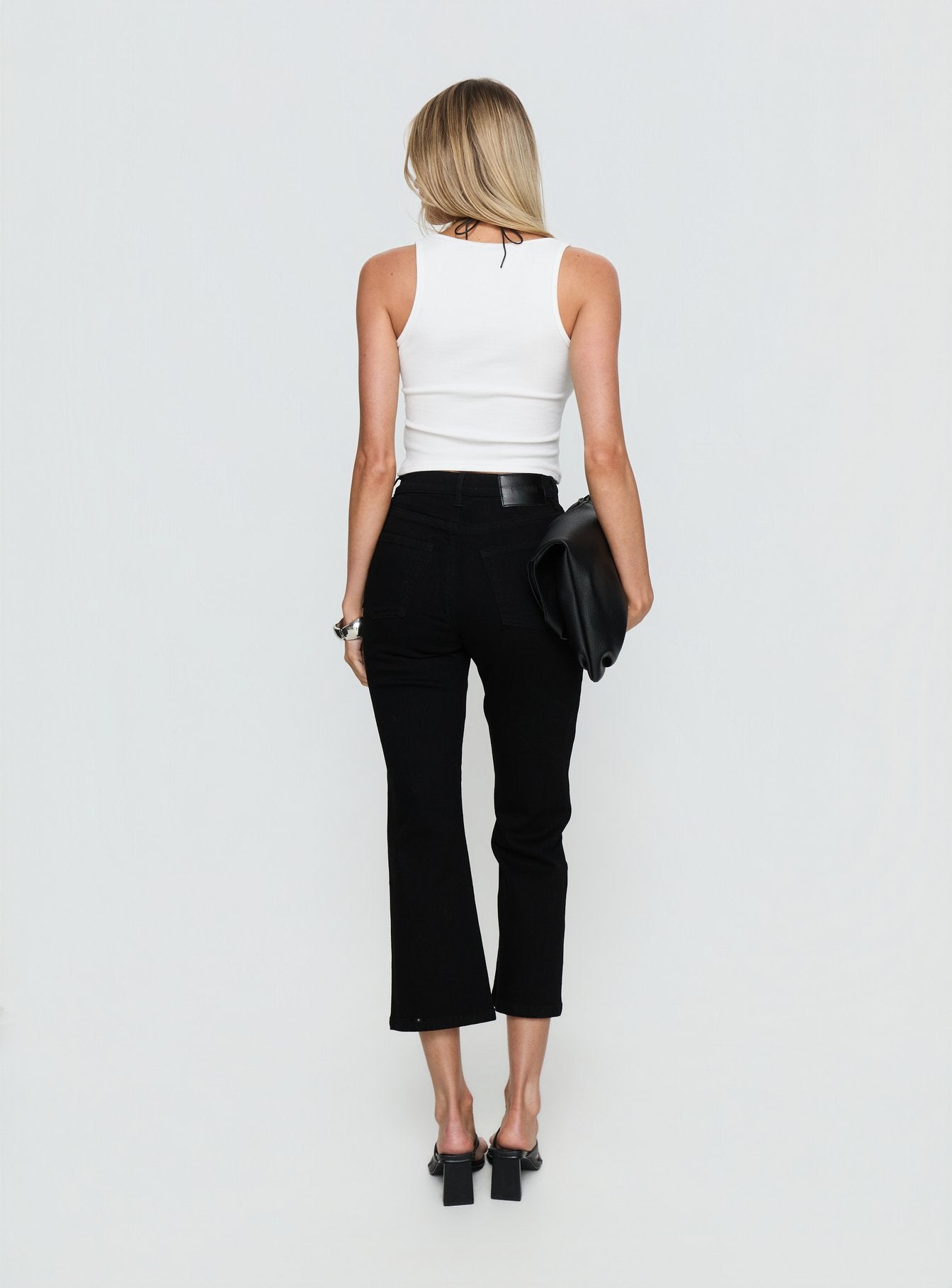 back view of model wearing Princess Polly Cindee High Rise Cropped Jeans Jet Black High Rise Jeans 