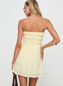 back view of model wearing Princess Polly Nnarlia Mini Dress Lemon Straight Neck 