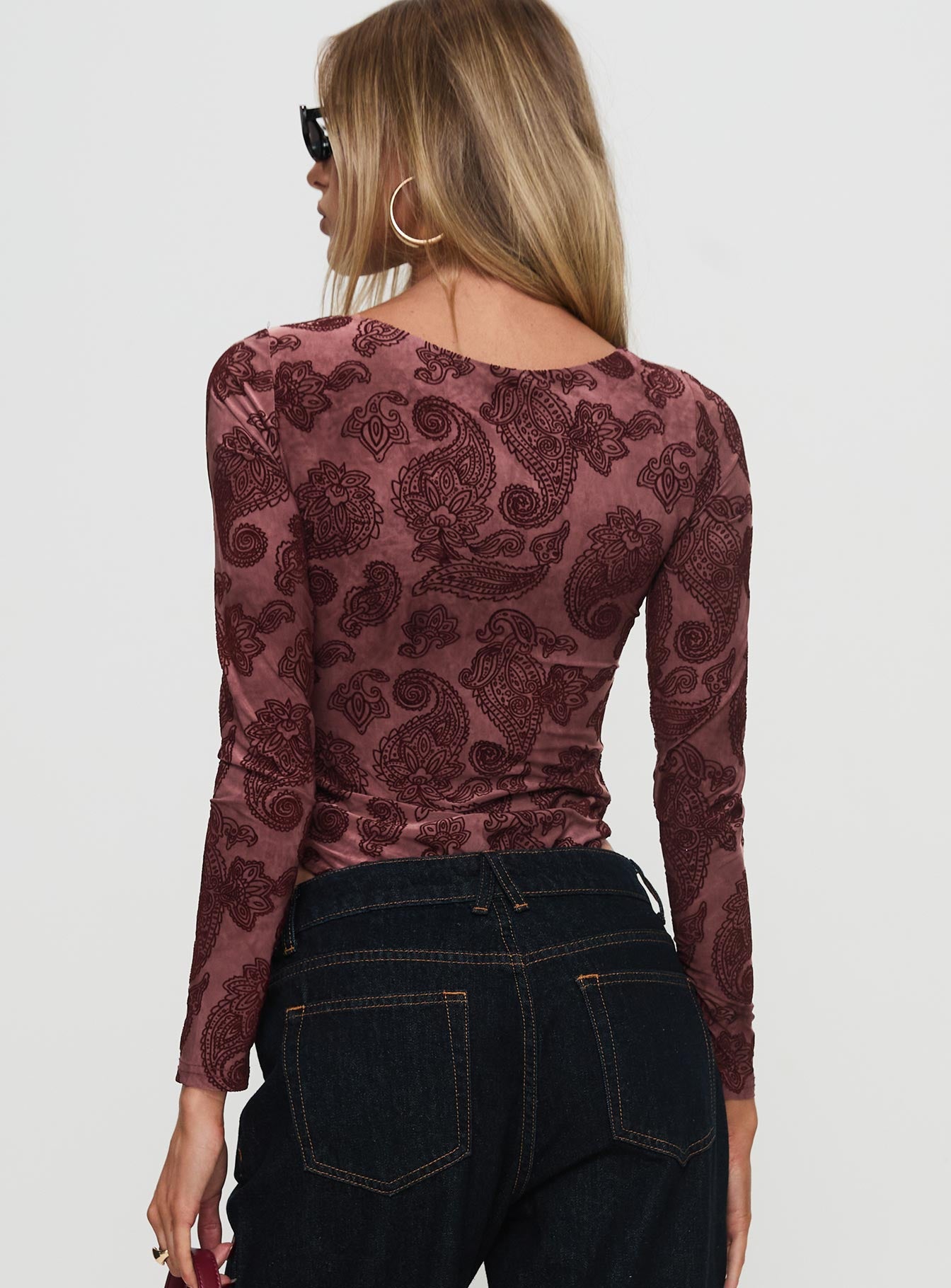 back view of model wearing Princess Polly Spruce Bodysuit Red Paisley Long Sleeve Tops 