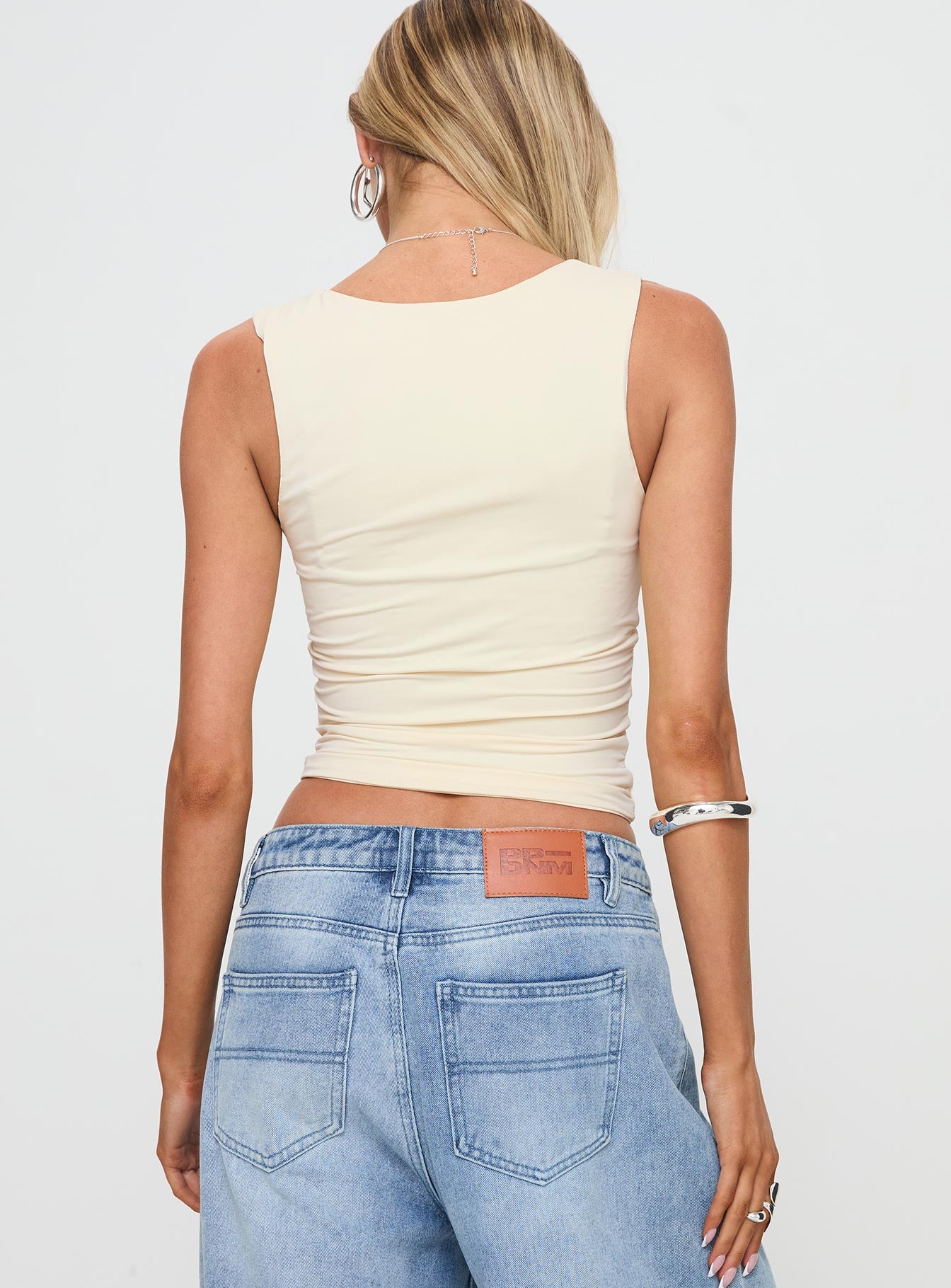 back view of model wearing Princess Polly Back In Time Top Cream/Blue Sleeveless Scoop Neck 