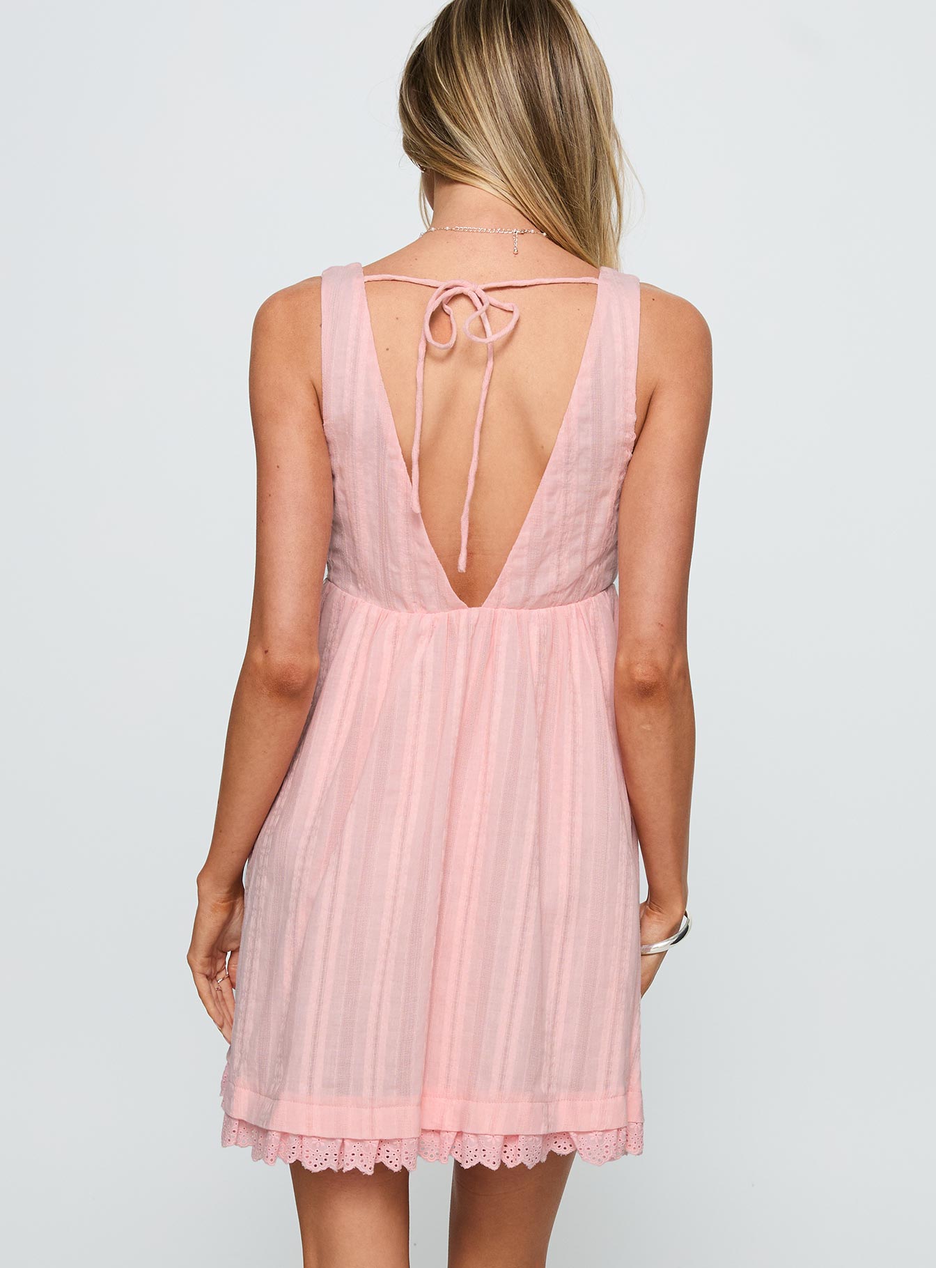back view of model wearing Princess Polly Nelty Mini Dress Pink Plunger 