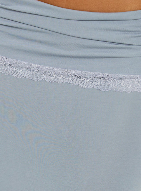 Highlighting the Zespri Jersey Maxi Skirt Slate with ruched details and lace hem Princess Polly