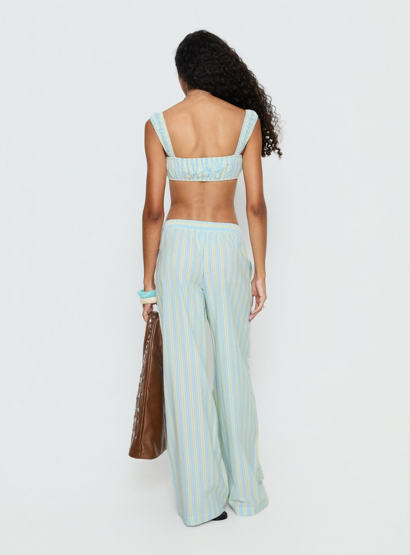 back view of model wearing Princess Polly Talyssa Elasticated Waist Pants Blue Stripe Mid Rise Pants Pants 