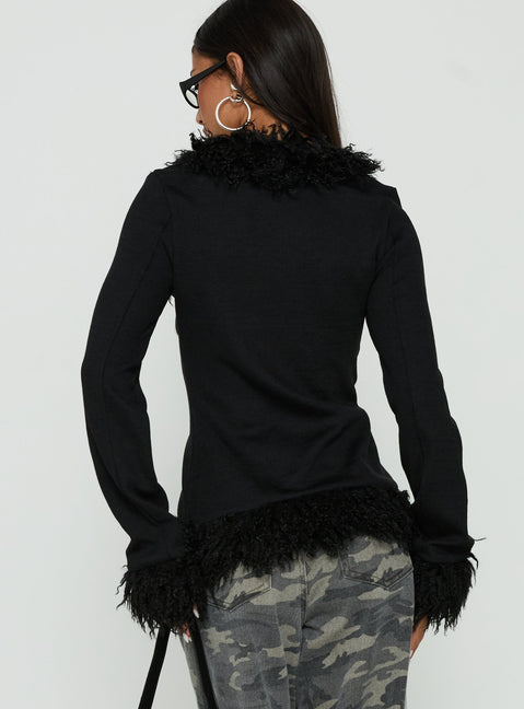 Designed with the Brynlie Faux Fur Trim Boxy Cardigan in Black womens-jumpers featuring short length back view of model wearing Princess Polly