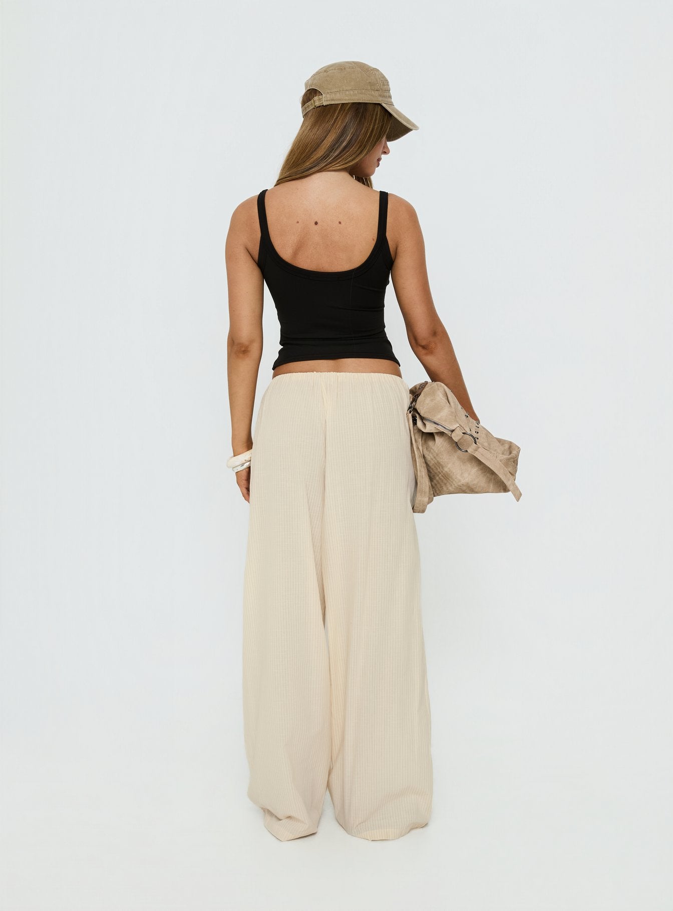 back view of model wearing Princess Polly Lunea Concealed Waistband Pants Beige Stripe Low Rise Pants Pants 