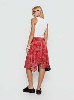 back view of model wearing Princess Polly Raenah Asymmetrical Midi Skirt Red Paisley 