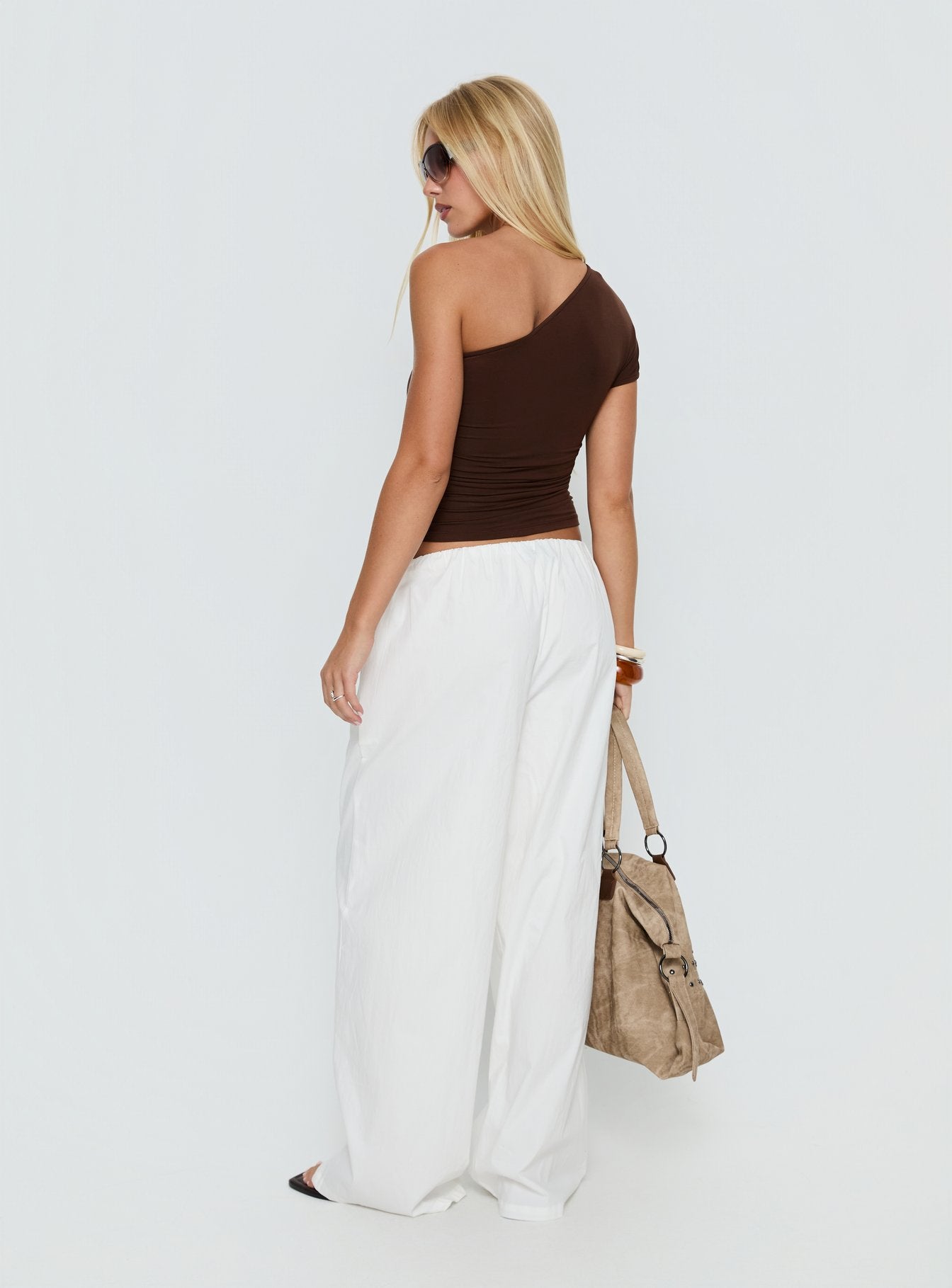 back view of model wearing Princess Polly Lunea Concealed Waistband Pants White Low Rise Pants 