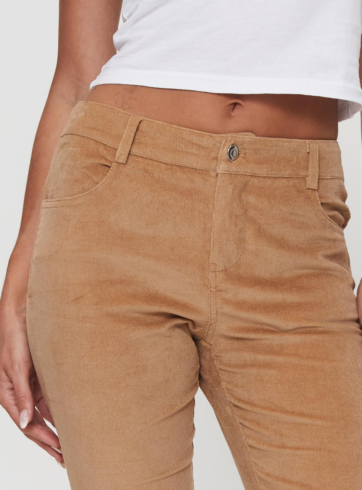 back view of model wearing Princess Polly Troubadour Low Waist Jeans Tan Pants 
