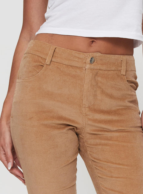 back view of model wearing Princess Polly Troubadour Low Waist Jeans Tan Pants 