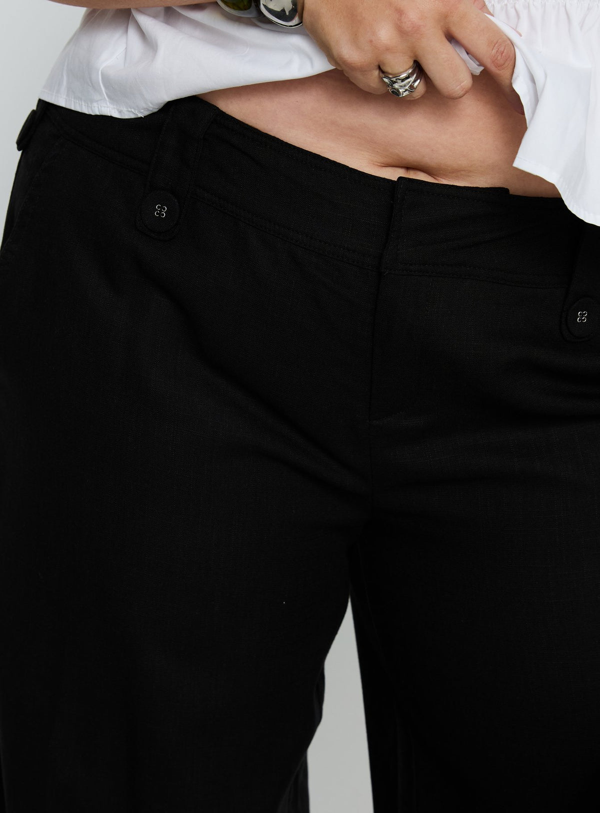 back view of model wearing Princess Polly Pedra Wide Leg Pant Black Curve Mid Rise Pants 