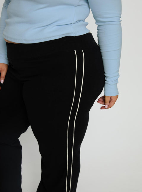 back view of model wearing Princess Polly Ascenda Straight Leg Track Pant Black Curve Mid Rise Pants 