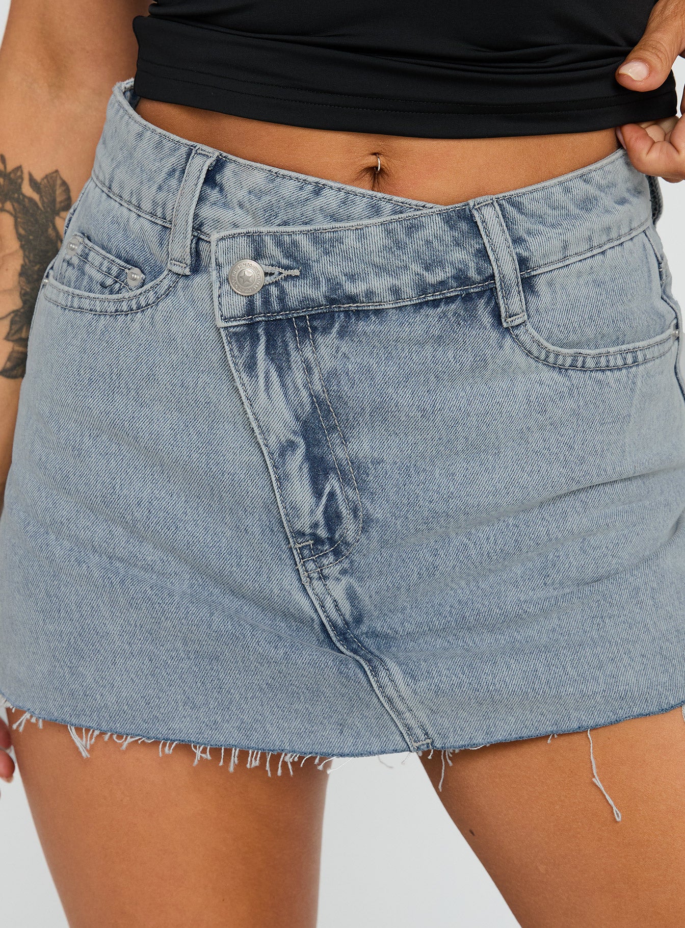 back view of model wearing Princess Polly Make My Day Mid Rise Denim Skort Light Wash High Waisted Shorts 