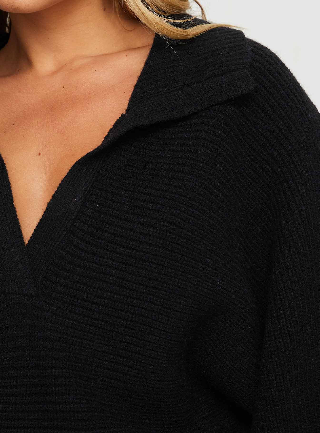 back view of model wearing Princess Polly Thorelle Sweater Mini Dress Black V-Neck 