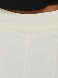 Highlighting the Ambrosea Panelled Midi Skirt Cream womens-skirts with lace details and hem Princess Polly