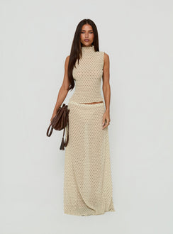 Introducing the Ford Maxi Skirt Butter Chocolate Polka Dot in womens-skirts, featuring a maxi length silhouette front view of model wearing Princess Polly
