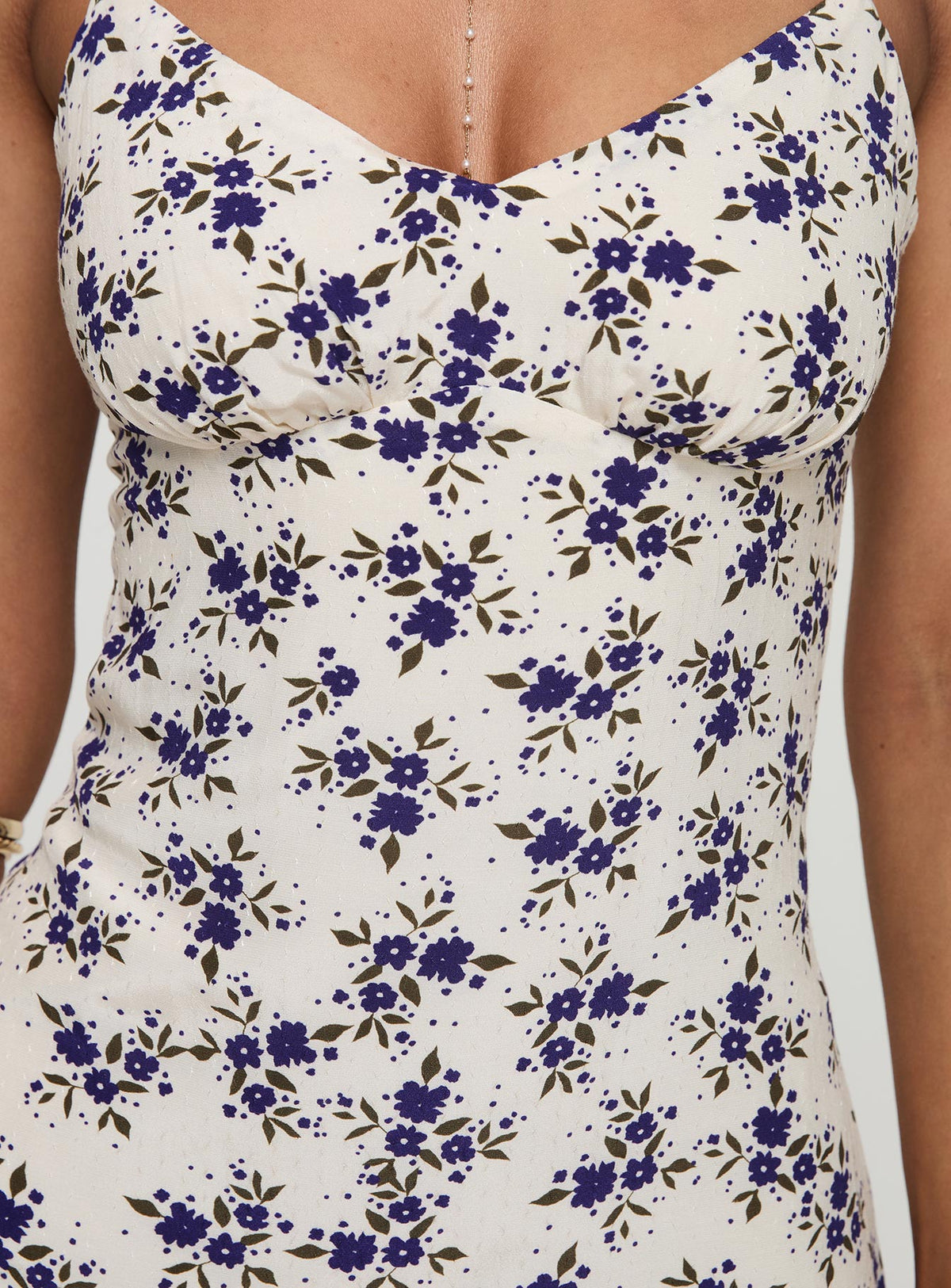back view of model wearing Princess Polly Jaye Mini Dress White / Blue Floral V-Neck 
