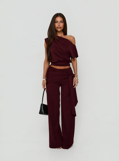 Featuring the Hadlia Tie Waist Pants Burgundy womens-regular-pants with high-rise detail front view of model wearing