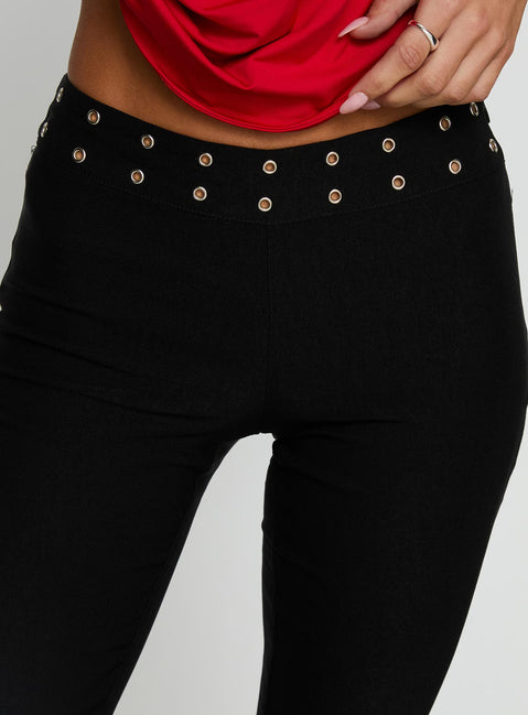 back view of model wearing Princess Polly Yevina Eyelet Flare Pant Black Low Rise Pants 