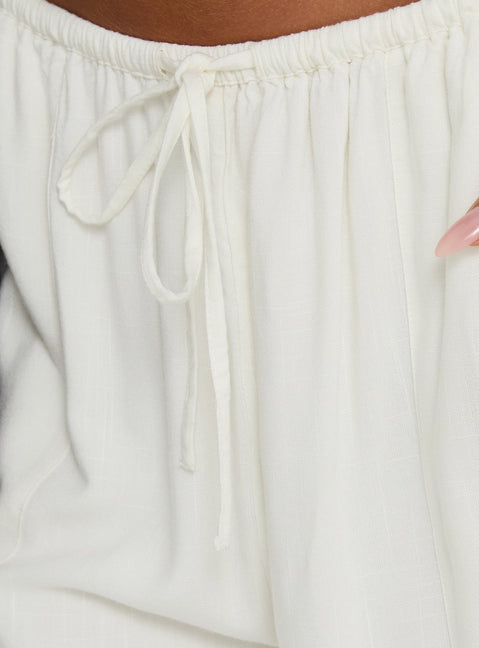 Elevating your wardrobe with Peacemaker Tie Waist Relaxed Pants Off-White in womens regular pants mid-rise detail Princess Polly