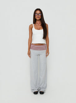 Showcasing Jetset Pants Grey / Red Stripe womens-regular-pants with mid-rise front view of model wearing